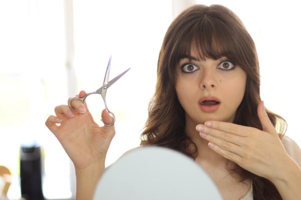 Cut Your Bangs Too Thick? Here’s How To Fix Them